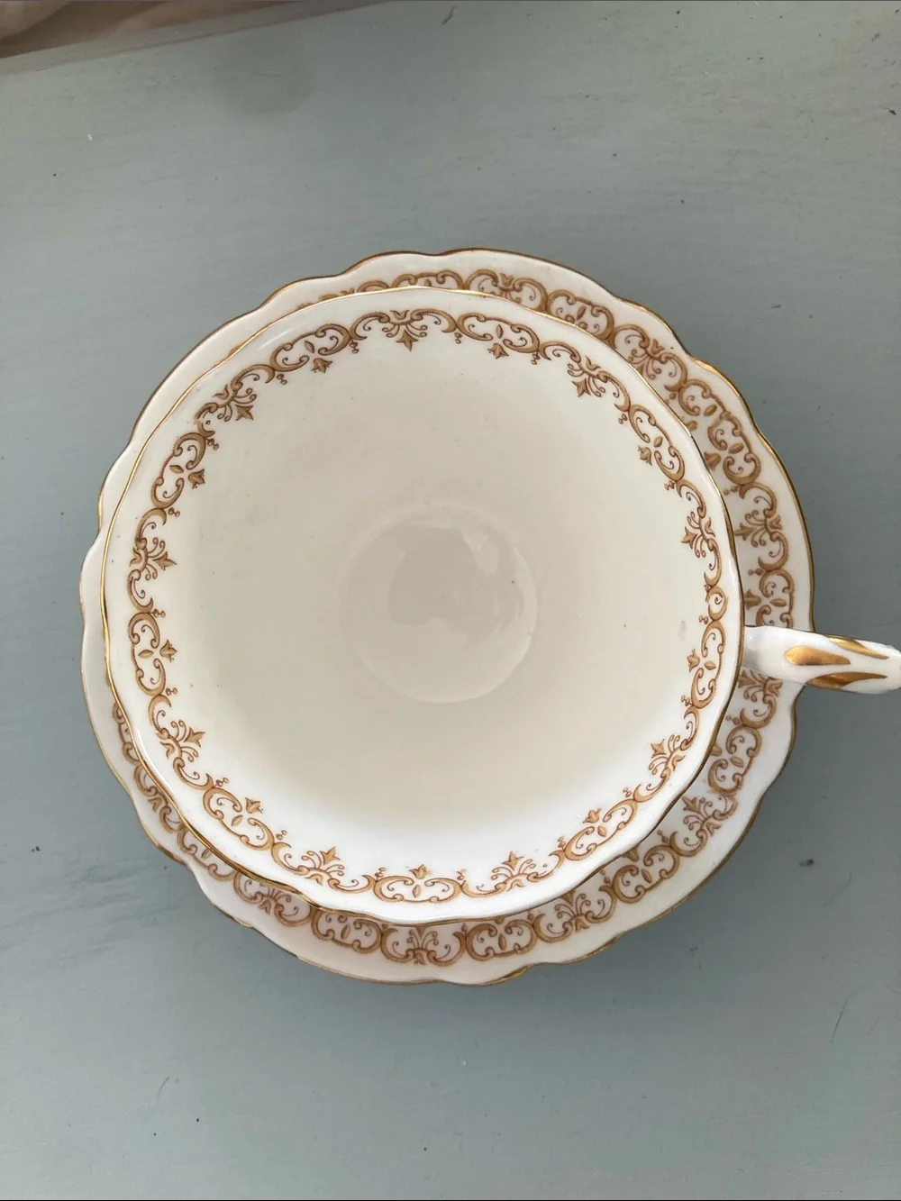Floral Porcelain Teacup and Saucer with Pink Rose Motif